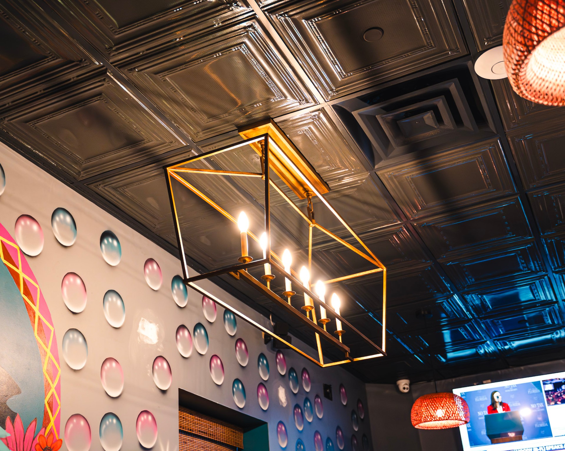 Pressed-tin ceiling and pendant lighting in the dining room